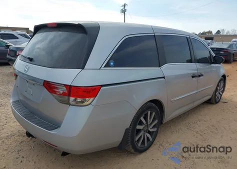 2014 Honda Odyssey Lx z USA, uszkodzony, nr VIN 5FNRL5H27EB033961